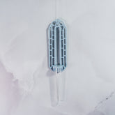 "Front view of empty MARBLE Wall Propagation unit, showcasing a single clear tube mounted on an elegant marble base."